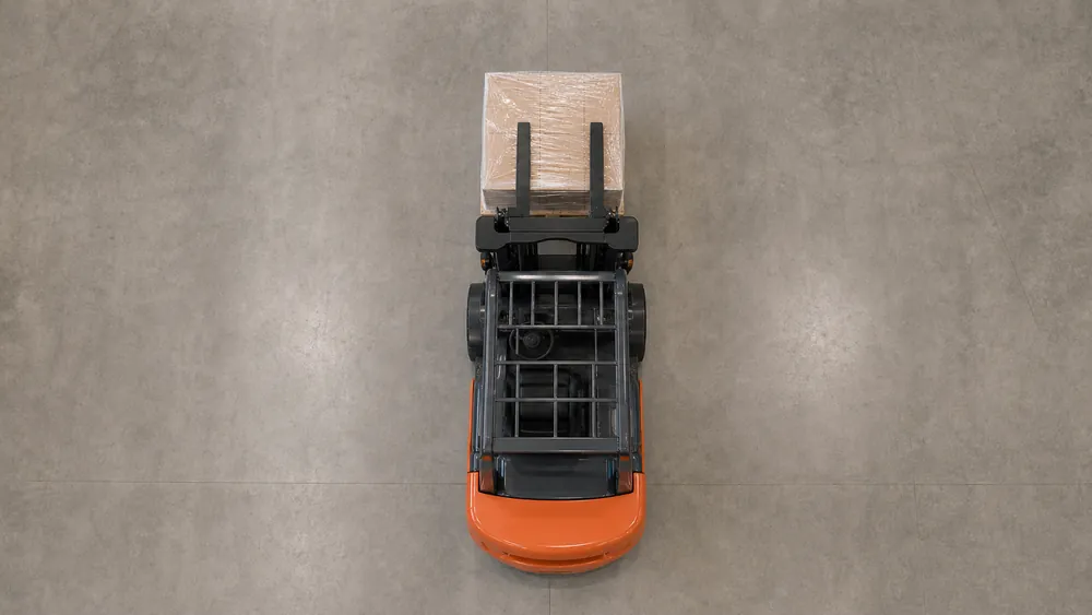 Top-down view of a forklift on a warehouse floor showing how it steers from the rear wheels